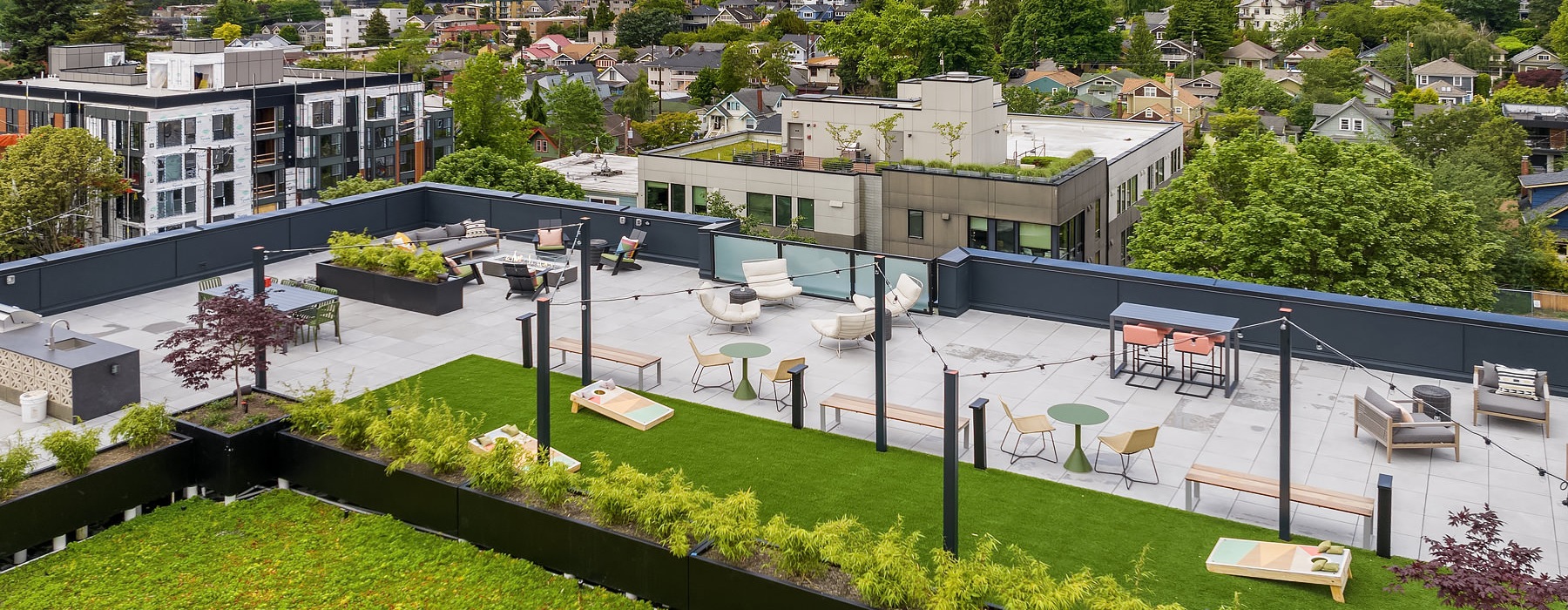Aerial View of Rooftop with Seating, Green Space and BBQ
